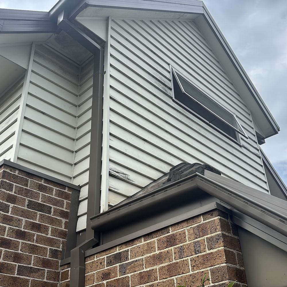 Cladding showing water entry that invites decay and termite activity, found during a defect investigation inspection in Pascoe Vale