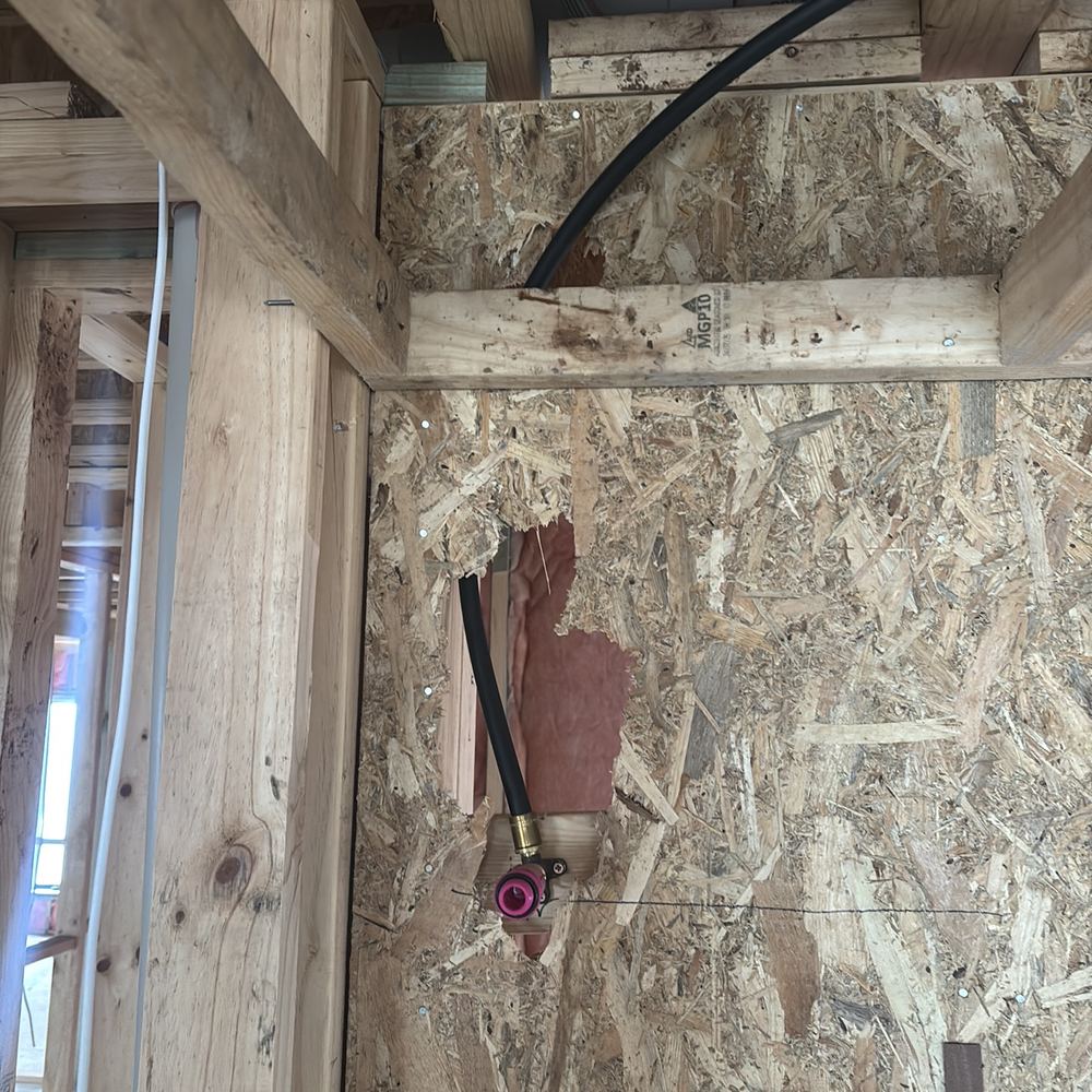 Wall bracing cut through after the frame stage, losing its lateral strength, found during a lock-up inspection in Beveridge