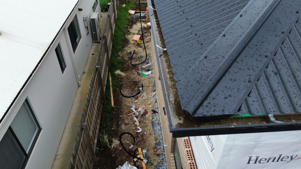 Sarking left long where it runs past the edge of the roof cladding, found during a lock-up inspection in Beveridge
