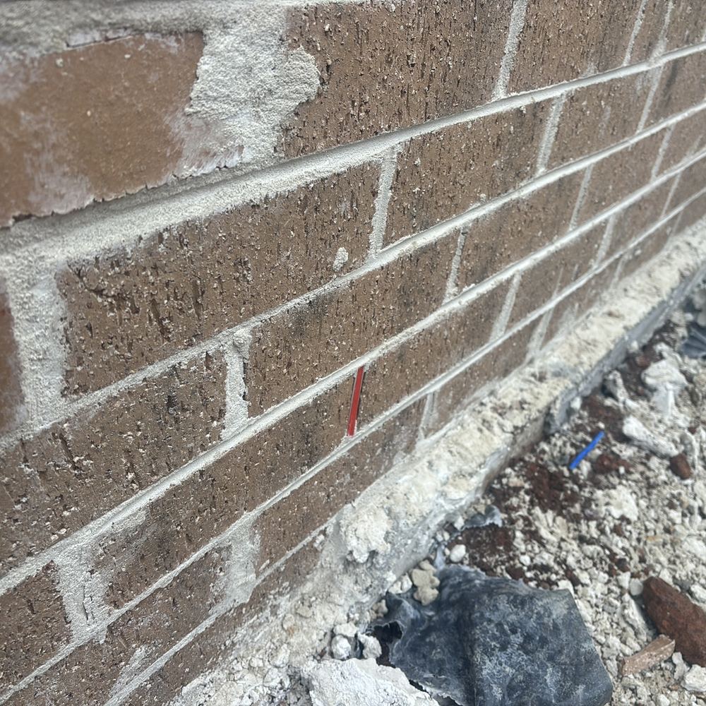 Weep holes finished at the brick face, where render will close them over, found during a lock-up inspection in Beveridge