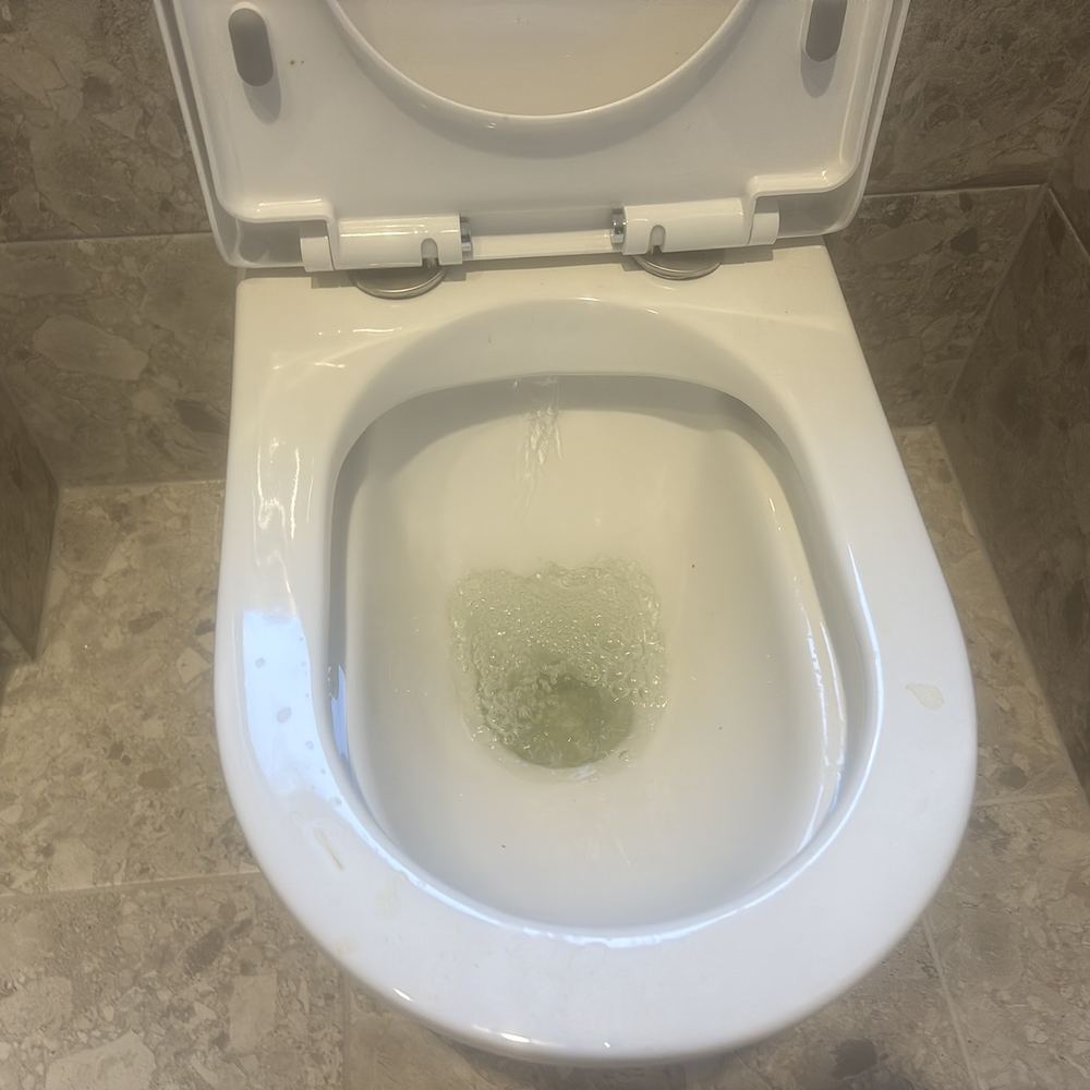 Basin draining slowly when tested by hand at handover, Beveridge