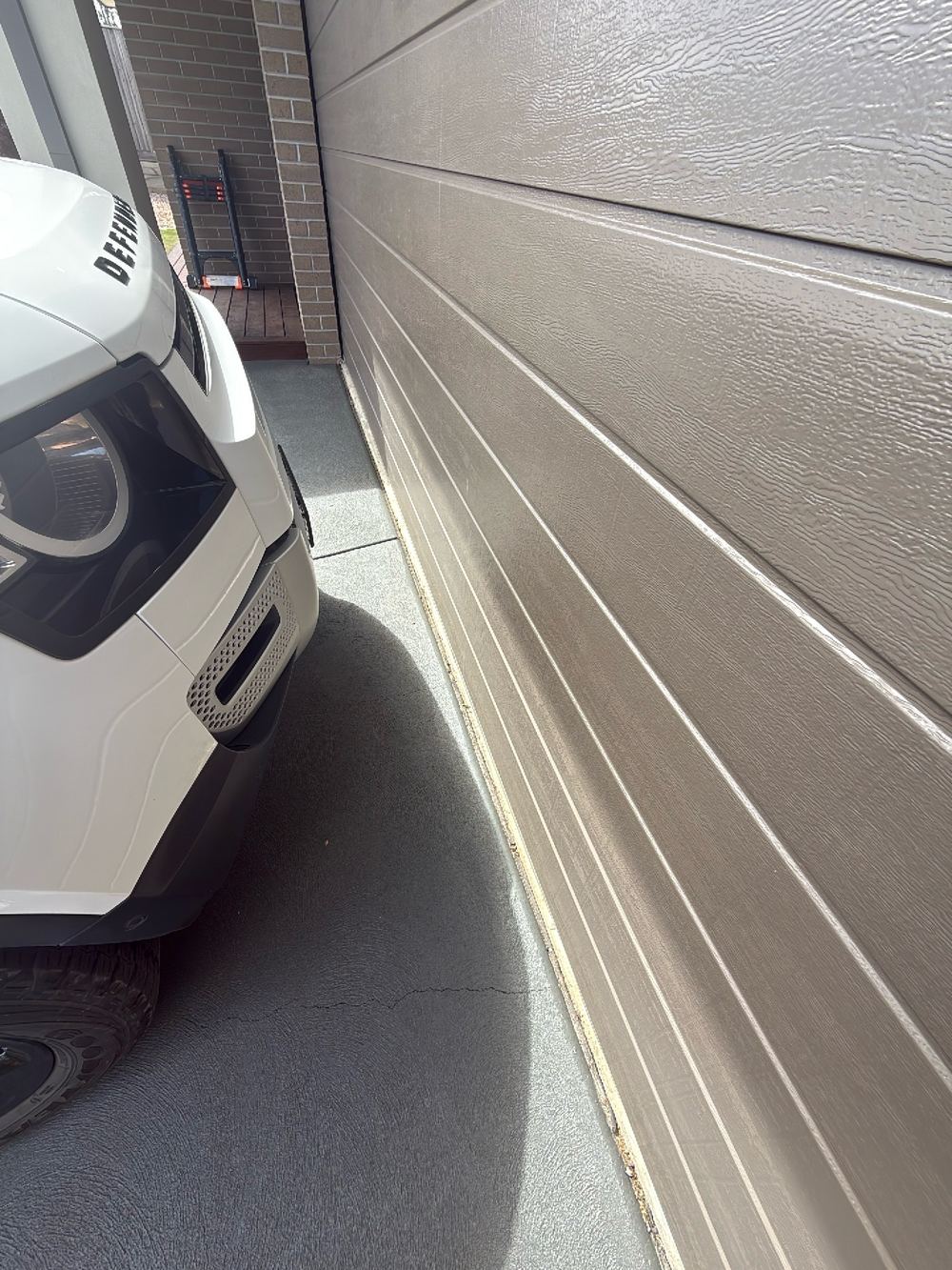 Isolation joints between the paving and the walls left unsealed, found during a pre-purchase building and pest inspection in Doreen