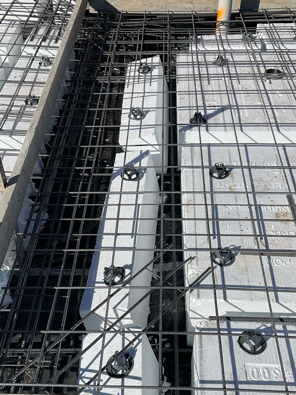 Internal slab beam pinched by a waffle pod, short of its 110mm width, found during a slab pre-pour inspection in Beveridge